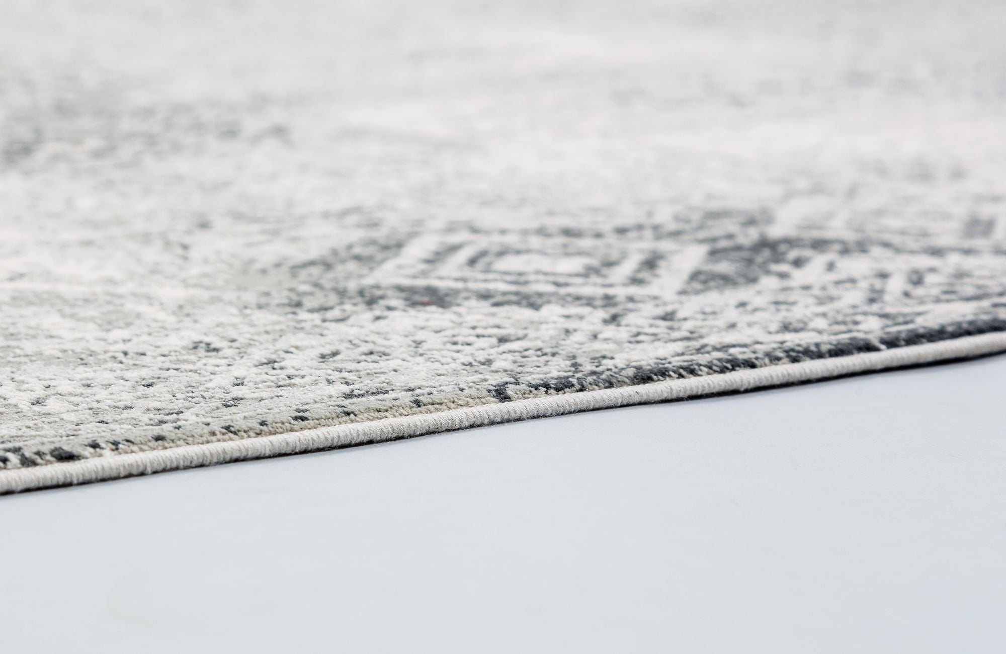 Astra Positano 6688 Webteppich Grau/Creme Bordüre